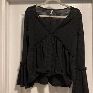 Sage black ruffled wrap top with bell sleeves and cutout in front size M